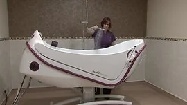 Transcare posture management bath with tilt and high low functions, digital (Rada sense) mixer and base